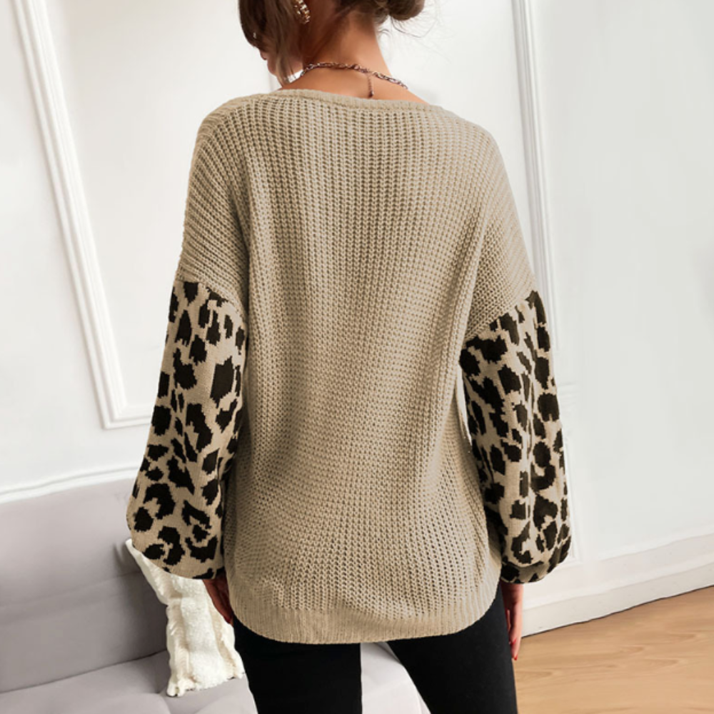 Maglione da donna con scollo a V e maniche con stampa leopardata 